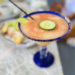Ambriza - Strawberry Cucumber Margarita with Tajín on the rim