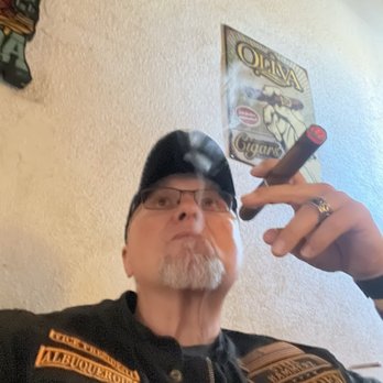 Padres Cigars - Sitting in the lounge enjoying a cigar. - Cigar Bars Near Me - Corrales, New Mexico