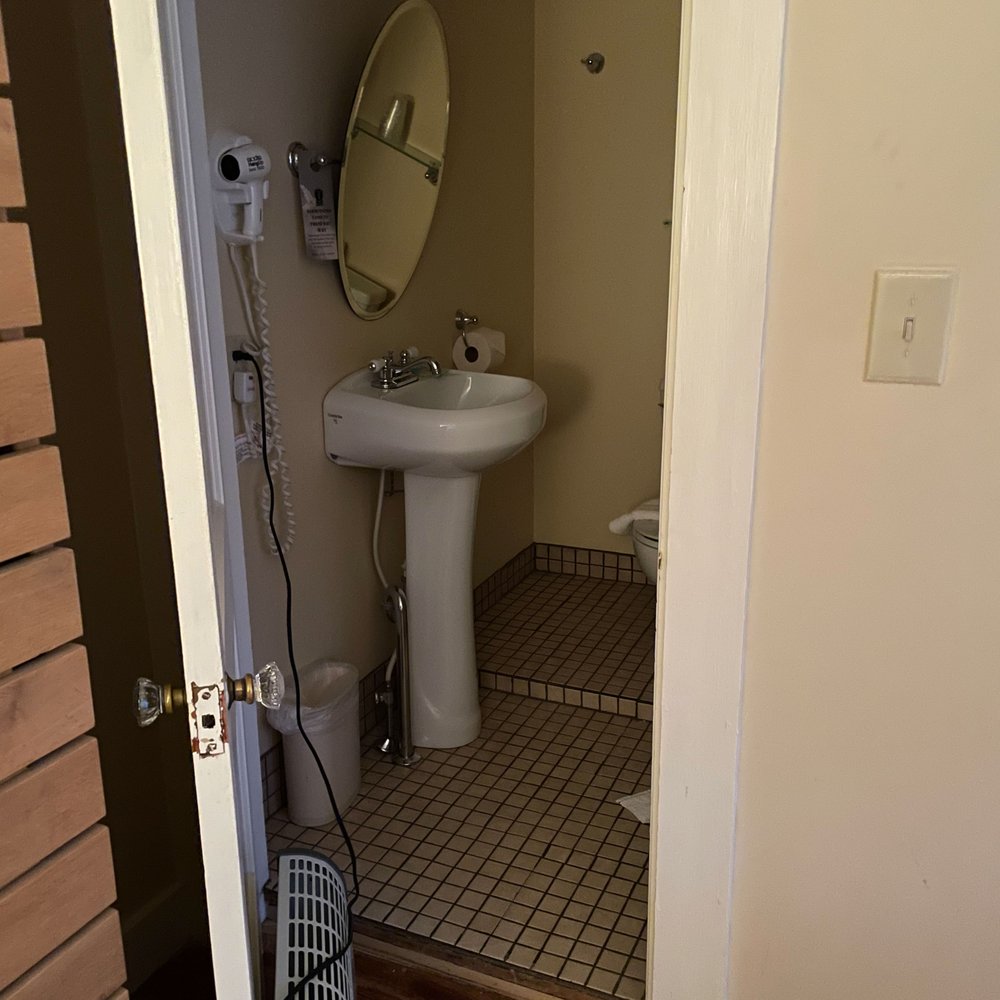 Kennebunk Inn - Space heater plugged in bathroom to hold open broken door. - Hotels Near Me - Kennebunk, Maine Kennebunk Inn - Space heater plugged in bathroom to hold open broken door. - Hotels Near Me - Kennebunk, Maine