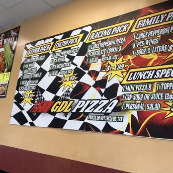 GDL Pizza - a large menu on the wall - Pizza Near Me - Colton, California