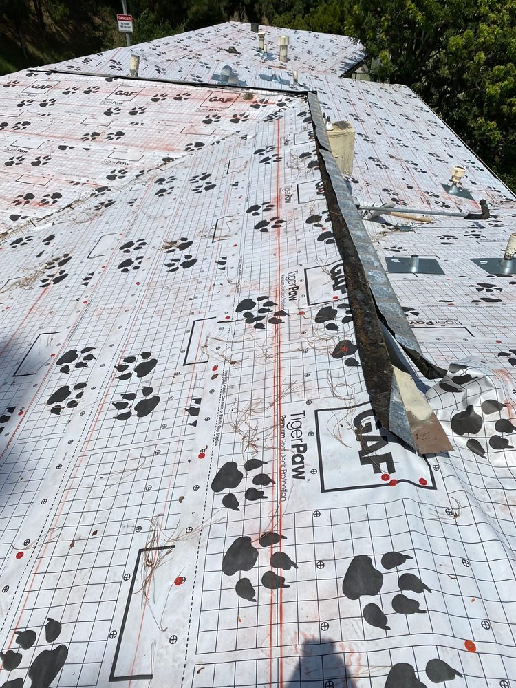 Slide of United Frontier Roofing