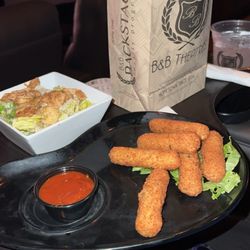 B&B Theatres Wesley Chapel The Grove 16 - Ceaser salad, mozzarella sticks, and a small popcorn