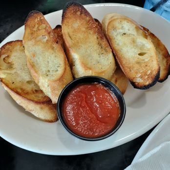 Thiago’s Italian Kitchen and Bar Heath - Free bread app with marinara sauce. A cup of sauce for each person. - Italian Near Me - Heath, Ohio Thiago’s Italian Kitchen and Bar Heath - Free bread app with marinara sauce. A cup of sauce for each person. - Italian Near Me - Heath, Ohio