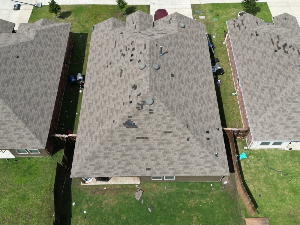 Slide of Taylored Roofing