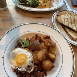 Steak & mushroom hash foreground, smoked salmon Benedict background and toast in mid ground. Steak & mushroom hash foreground, smoked salmon Benedict background and toast in mid ground.
