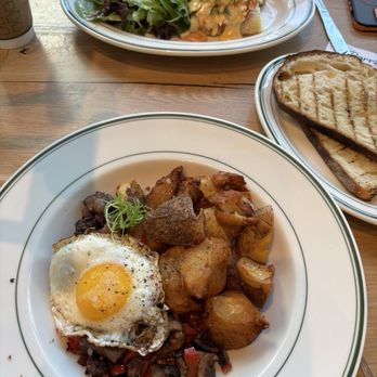 Barrett's Quality Eats - Steak & mushroom hash foreground, smoked salmon Benedict background and toast in mid ground. - Bakeries Near Me - Coralville, Iowa Barrett's Quality Eats - Steak & mushroom hash foreground, smoked salmon Benedict background and toast in mid ground. - Bakeries Near Me - Coralville, Iowa