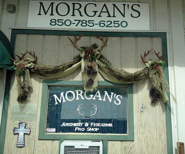 Mor-Guns Archery & Firearms Pro Shop Logo