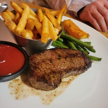 Chop Steakhouse & Bar - Top Sirloin - 7oz, finished with house garlic butter, topped with French sea salt, cracked pepper & chives - Seafood Near Me - Edmonton, Alberta Chop Steakhouse & Bar - Top Sirloin - 7oz, finished with house garlic butter, topped with French sea salt, cracked pepper & chives - Seafood Near Me - Edmonton, Alberta