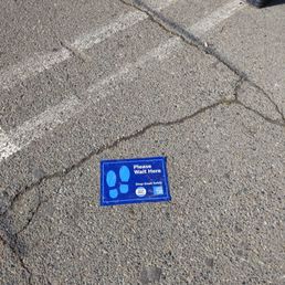 a parking ticket on the ground a parking ticket on the ground