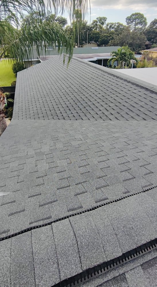 Slide of Green Leaf Roofing