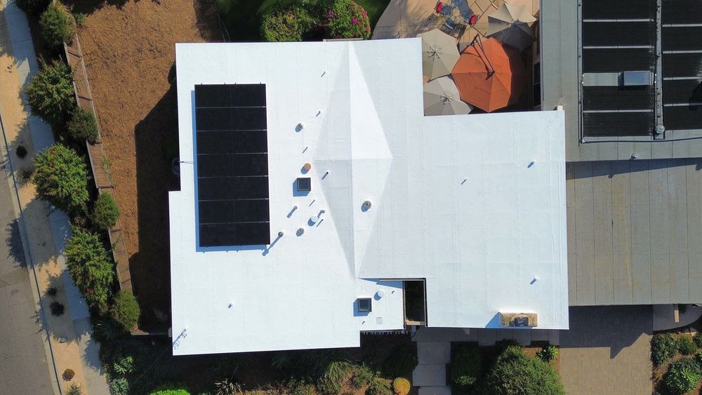 Slide of Dana Logsdon Roofing & Solar