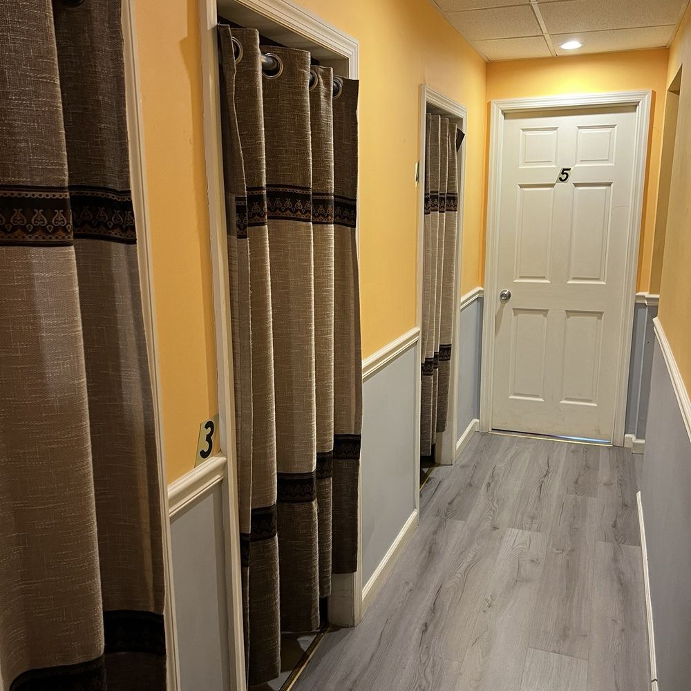 Peaceful Body Spa - To the rooms, curtains for single massages and doors for two person massages best I can tell - Massage Near Me - New York, New York