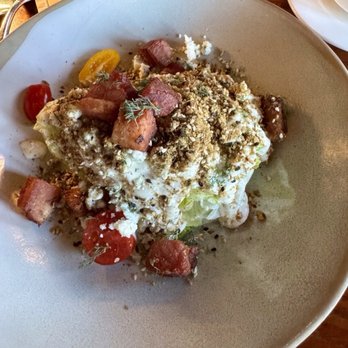 A Land Remembered - Wedge salad with bacon chunks - Steakhouses Near Me - Orlando, Florida A Land Remembered - Wedge salad with bacon chunks - Steakhouses Near Me - Orlando, Florida