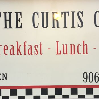 Curtis Cafe - a sign for the curtis cafe - American Near Me - Curtis, Michigan