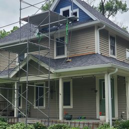 Scaffolding set up that helped get to the offset 3rd-level gable for repairs and painting