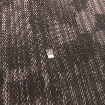 Courtyard by Marriott Austin Parmer/Tech Ridge - Trash on carpet. - Hotels Near Me - Austin, Texas