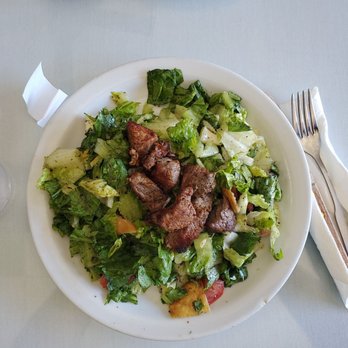 Kabab City - a plate of salad with meat and lettuce - Mediterranean Near Me - Fowler, California Kabab City - a plate of salad with meat and lettuce - Mediterranean Near Me - Fowler, California