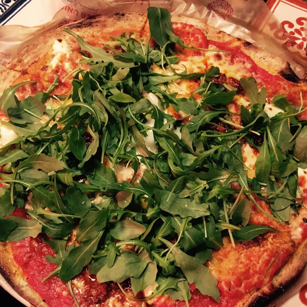 Calabria pizza - tomato sauce, mozzarella, mascarpone, n'duja spicy sausage, rocket