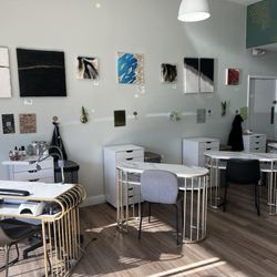 Oil & Buff - Nail side and art work for sale on the walls