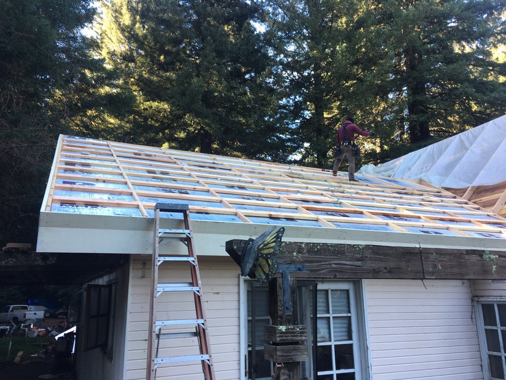 Slide of J E Johnson Roofing