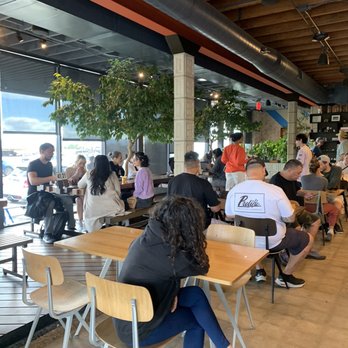 PublicUs - Cute trees in the middle of the dining area - Coffee & Tea Near Me - Las Vegas, Nevada PublicUs - Cute trees in the middle of the dining area - Coffee & Tea Near Me - Las Vegas, Nevada