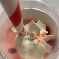 Steak ’n Shake - Half filled milk shake.