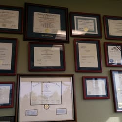Stephen H Christiansen, DDS - Wall of awards and certificates