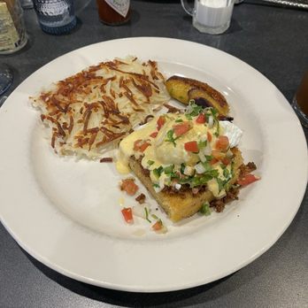 The High Hat - Cornbread Benedict with fried plantains and hash browns. - Pancakes Near Me - Saint Paul, Minnesota The High Hat - Cornbread Benedict with fried plantains and hash browns. - Pancakes Near Me - Saint Paul, Minnesota