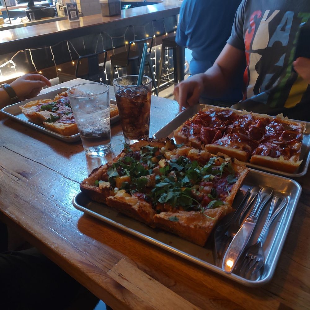 Redhook Brewlab - This is a cheese pizza and pepperoni pizza and a ham pineapple pizza. They all sucked. - Breweries Near Me - Seattle, Washington