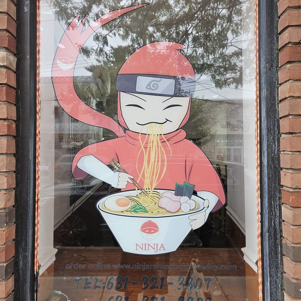 a man eating ramen a man eating ramen