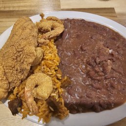 Taste of NOLA. Jambalaya, red beans and rice, fried shrimp and fried catfish Taste of NOLA. Jambalaya, red beans and rice, fried shrimp and fried catfish