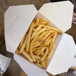 Fries. Menu says fries and onion rings idk why they are grouped lol but beware they are separate. Fries. Menu says fries and onion rings idk why they are grouped lol but beware they are separate.