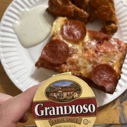 Jet's Pizza - Pizza is amazing. Wings are fatty. And this is their new garlic butter. No longer homemade
