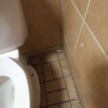 Circle K - a white toilet and tiled floor - Convenience Stores Near Me - El Paso, Texas