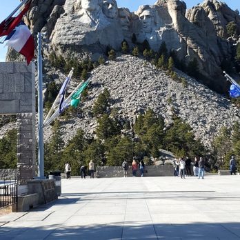 Mount Rushmore National Memorial - Wide shot with other folks looking on - Landmarks & Historical Buildings Near Me - Keystone, South Dakota Mount Rushmore National Memorial - Wide shot with other folks looking on - Landmarks & Historical Buildings Near Me - Keystone, South Dakota