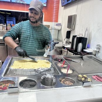Maya Creamery & Lounge - Vamshi making our Indian rolls - Ice Cream & Frozen Yogurt Near Me - McKinney, Texas