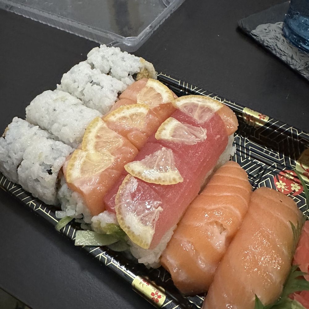 Spicy Salmon Roll (left), Yuki Roll (middle), Salmon Sushi (right) Spicy Salmon Roll (left), Yuki Roll (middle), Salmon Sushi (right)