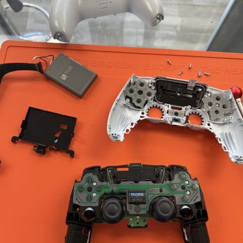 Pixel Patch Repair - PS5 Controller stripped down for a key flex cable replacement - Mobile Phone Repair Near Me - Studio City, California Pixel Patch Repair - PS5 Controller stripped down for a key flex cable replacement - Mobile Phone Repair Near Me - Studio City, California