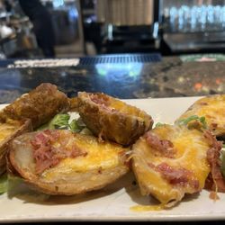 JF Kicks Restaurant & Patio Bar - Potato skins. Very thick and tasty.