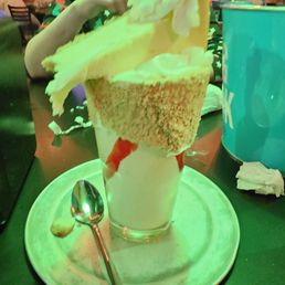 Grinch milkshake with am actual slice of cheesecake Grinch milkshake with am actual slice of cheesecake