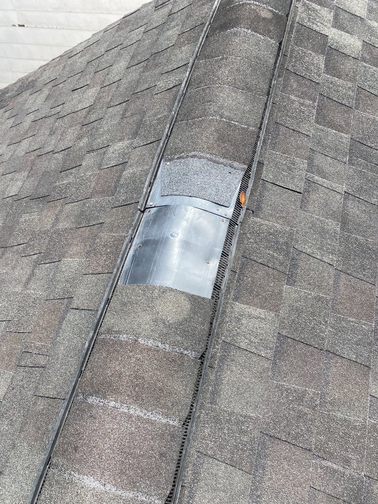 Slide of RKR Roofing