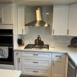 Love the new hood and large pull put soft-close drawers with gold hardware. Love the new hood and large pull put soft-close drawers with gold hardware.