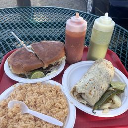 rice $6 , carne asada torta $9.50  & carnitas burrito $8.50 (prices as of oct. 2024)