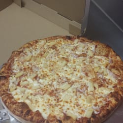 Aidan's Pizza - Pineapple and ham pizza. Aidan's pizza throw the ingredients underneath the cheese.