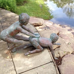 Pavilion Fitness - Don't fall in the retention pond little copper sculpture boy!
