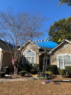 Slide of The Paris Roofing Company Too