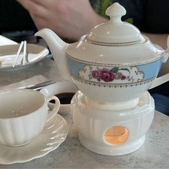 Zen Garden - Tea cup & Teapot over a warming candle - Vegetarian Near Me - Great Neck, New York Zen Garden - Tea cup & Teapot over a warming candle - Vegetarian Near Me - Great Neck, New York