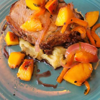 The Kill Devil Grill - Pork chop special - American Near Me - Kill Devil Hills, North Carolina