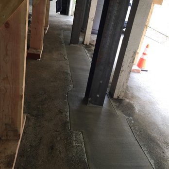 Alpha Structural - concrete grade beam in the parking area with a double cantilevered column moment structure - General Contractors Near Me - Sunland, California