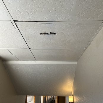 Holiday Inn The Lodge at Big Bear Lake - Holes in ceiling on my floor! - Big Bear, CA